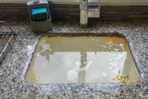 How to Unclog a Kitchen Sink that is Full of Water