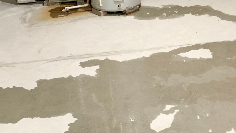 Water leak on basement concrete floor